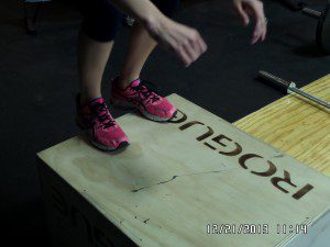 exercising box jumps