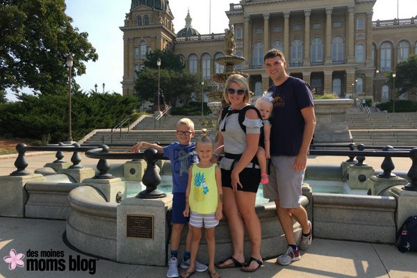 family in front of the Iowa State Capitol