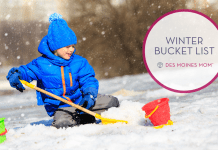 kid playing in snow - Winter Bucket List