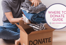 woman putting clothes in donation box. Donate Des Moines