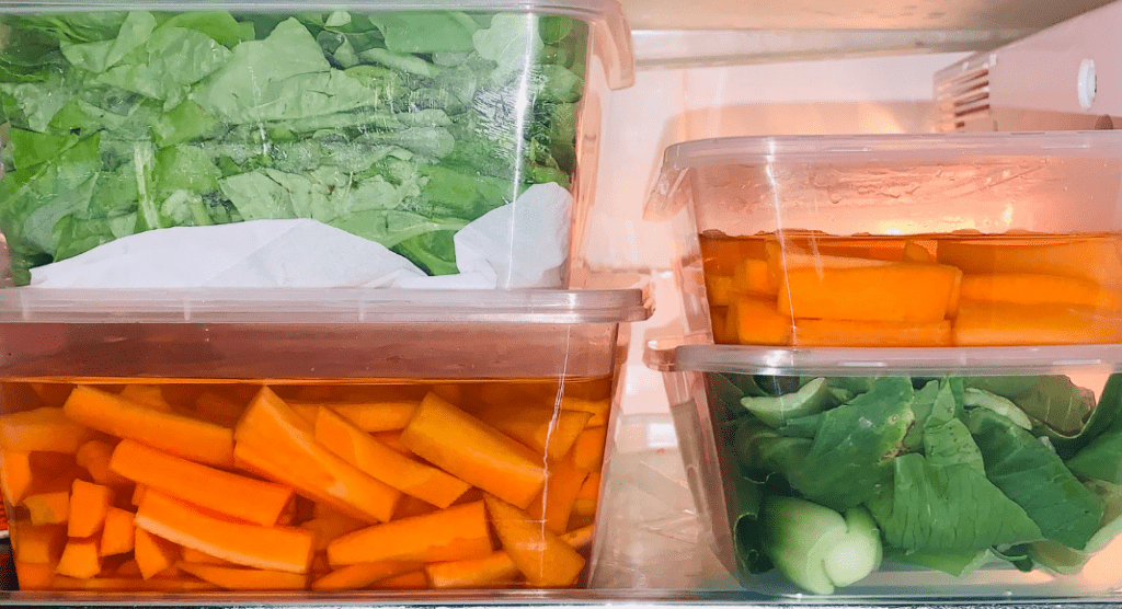 Containers of cut veggies. Sunday night prep des moines moms