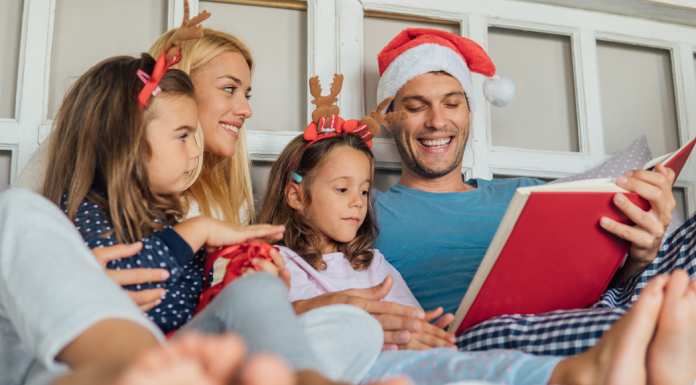 family reading christmas books Des Moines Mom
